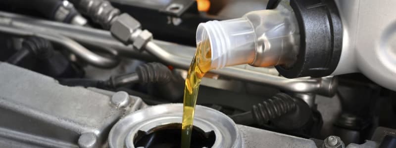 Oil change on a Renault New oil is poured into the tank of a Renault
