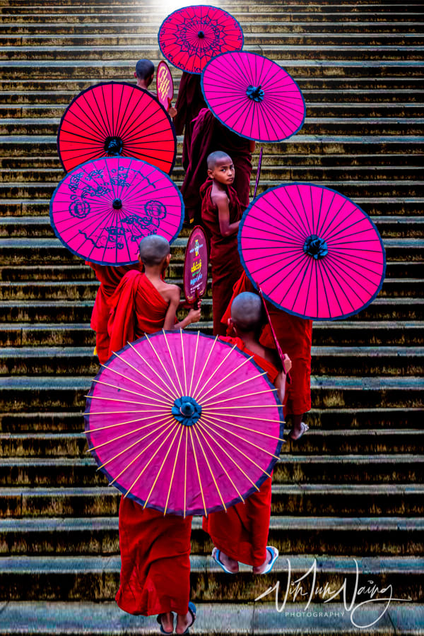 Monks Climbing Stairs in a Row