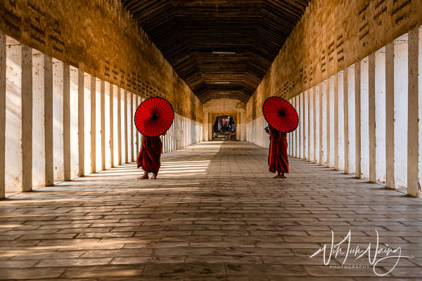 Two Novices with Umbrellas