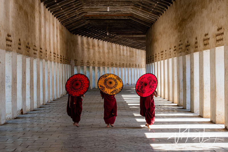 Three novices walking to a temple in Bagan
