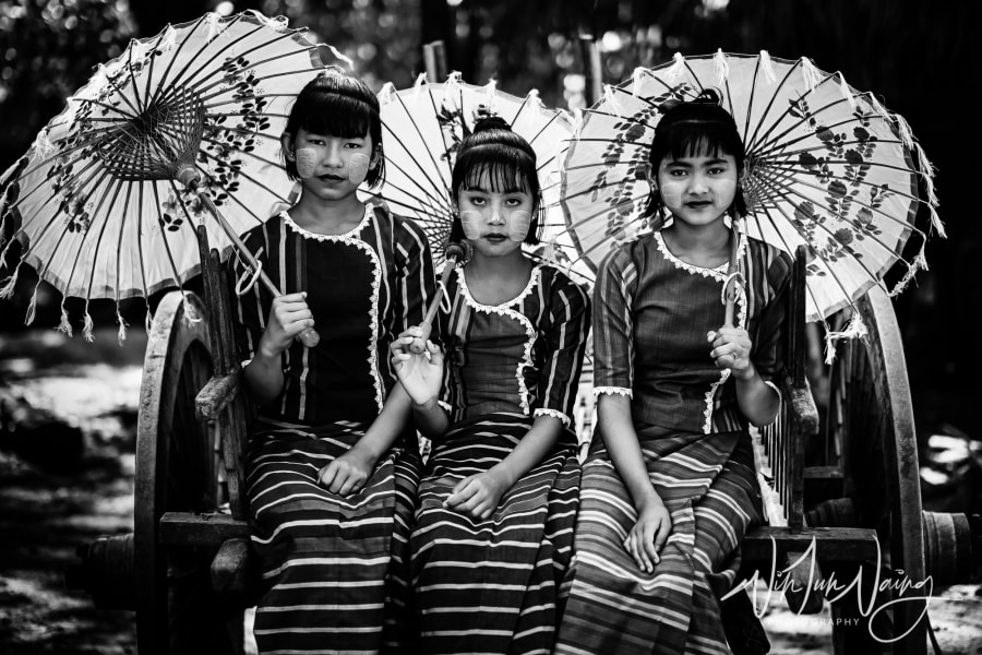Three Girls with Umbrella