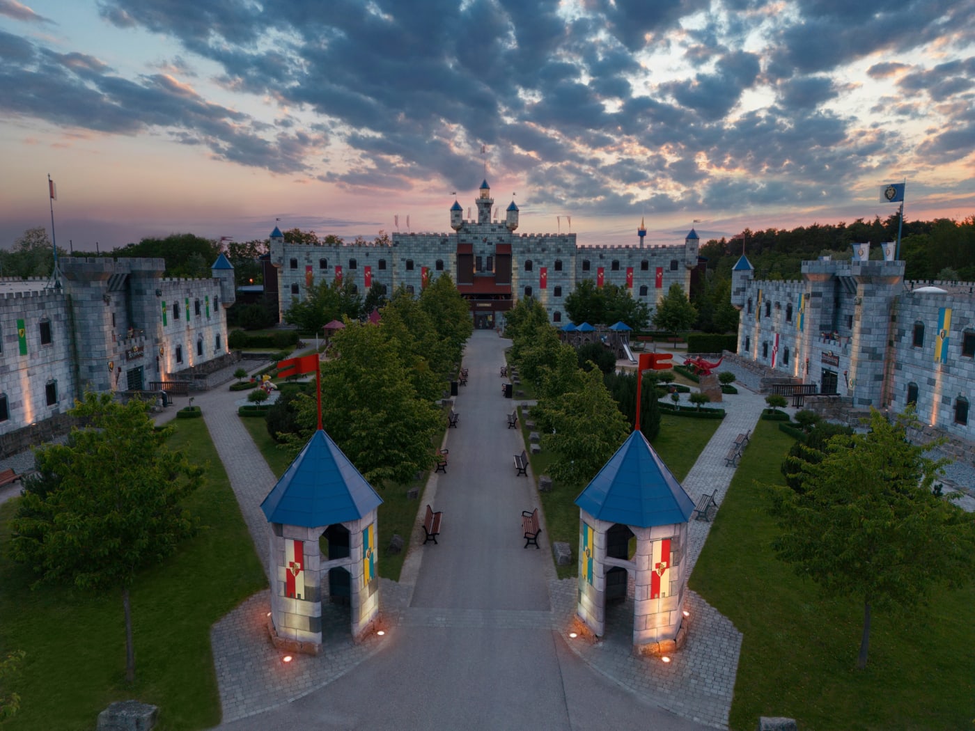The castle hotels of the Legoland Deutschland holiday village at dusk