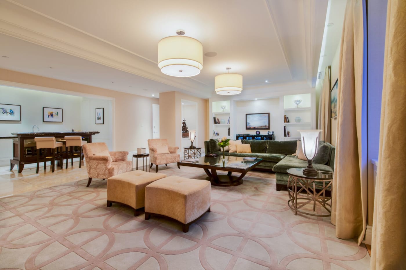 Second living room of the Royal Suite at The Ritz-Carlton Montréal with bar and armchairs