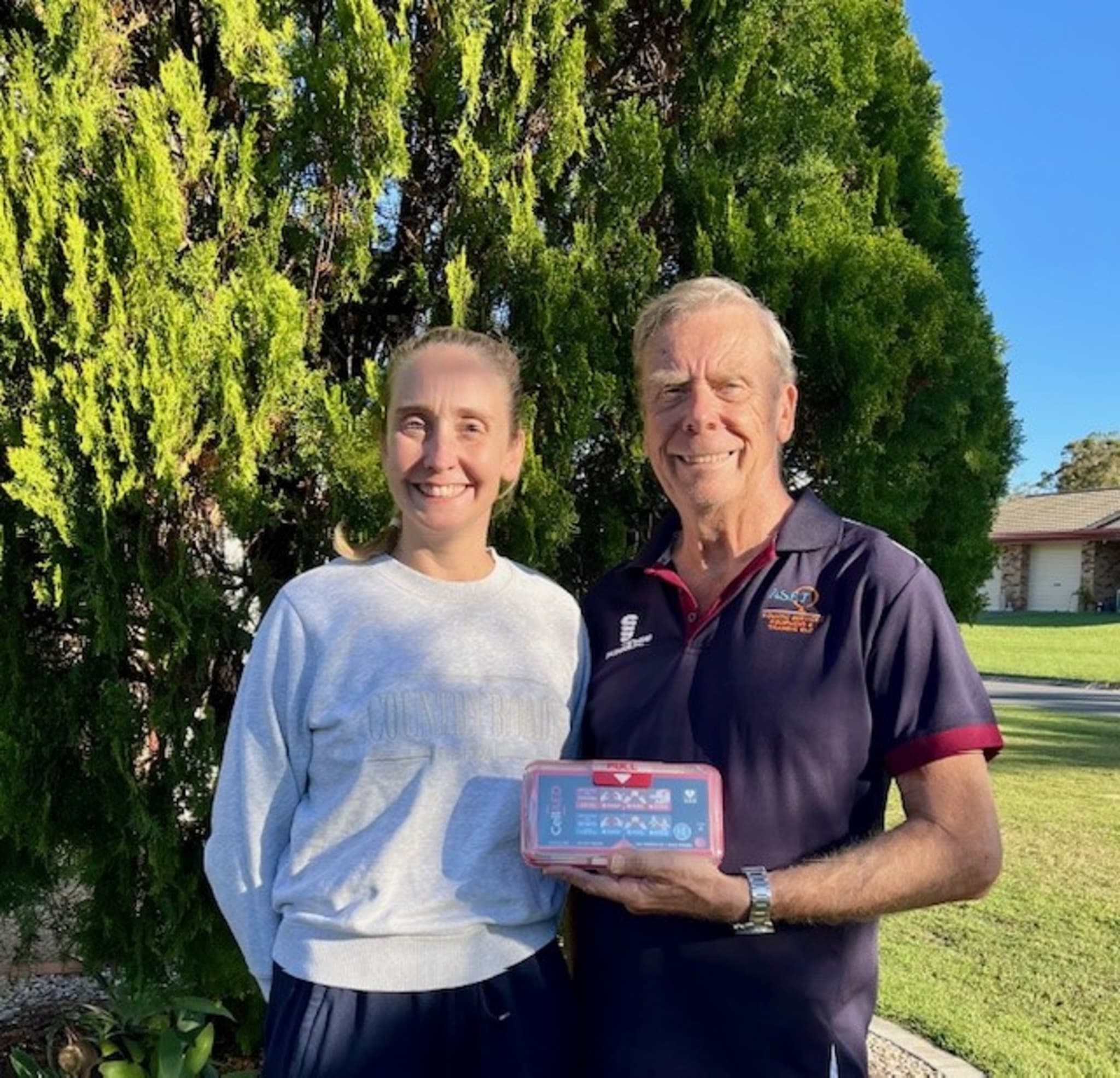 Picture of Ken and Jess holding CellAED