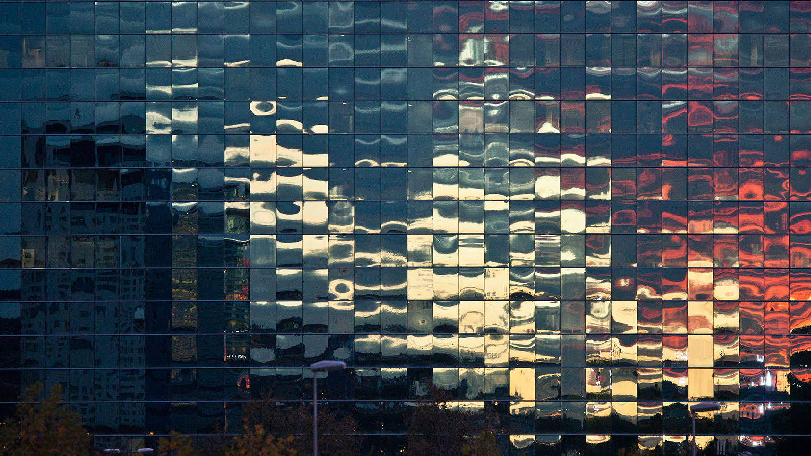A digital stock-market board showing share prices
