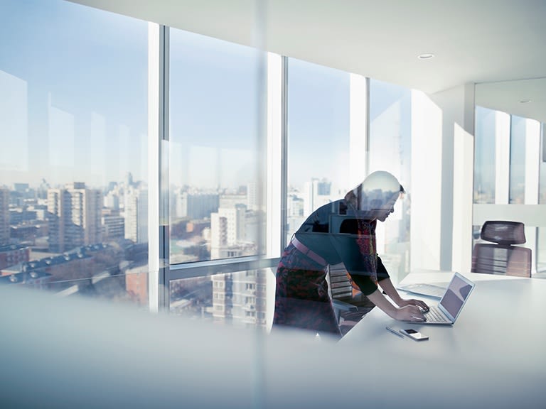 A colleague working with a secure digital interface