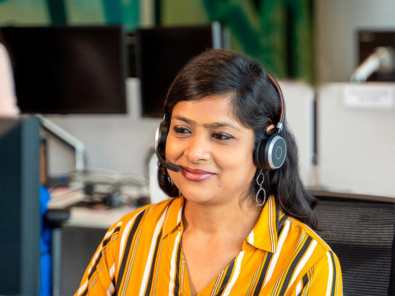 An HSBC contact centre colleague wearing a headset
