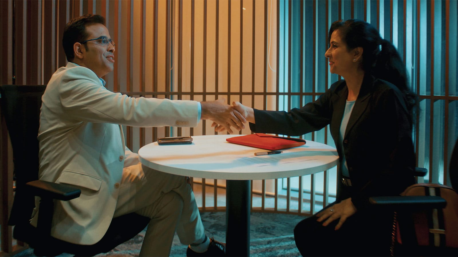 HSBC colleagues in conversation with a customer