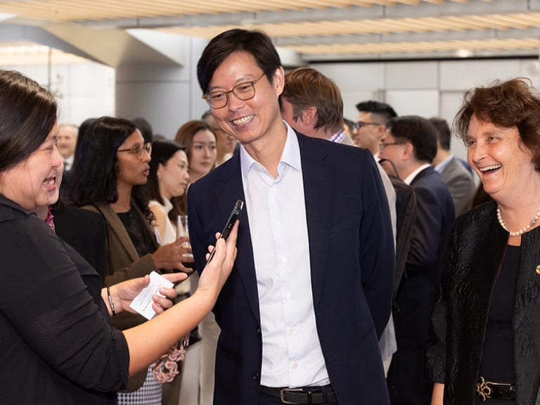 Delegates in conversation at an HSBC event