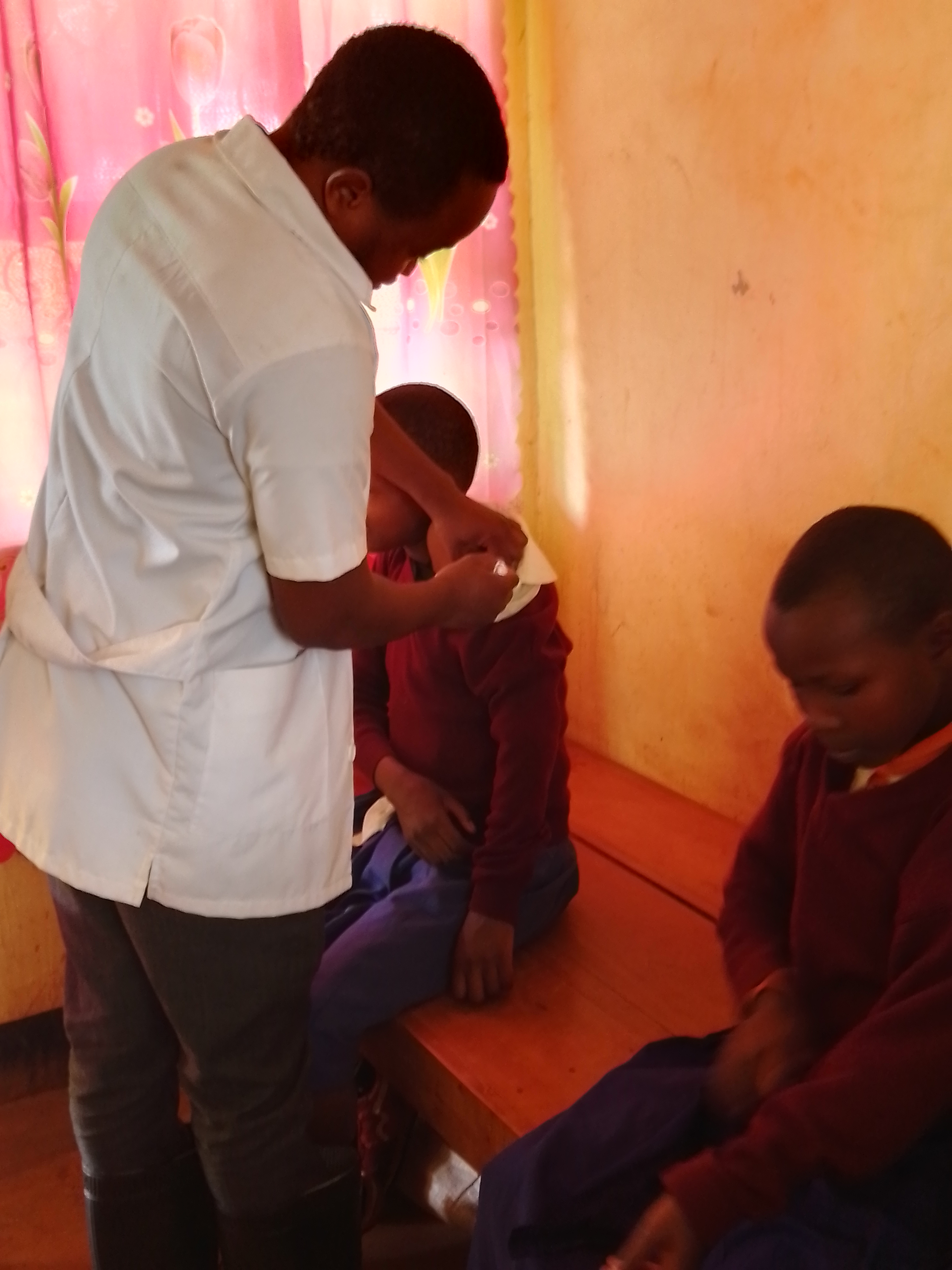 2022-01-31 Nurse at Managha Dispensary providing HPV vaccination to the student 2.jpg