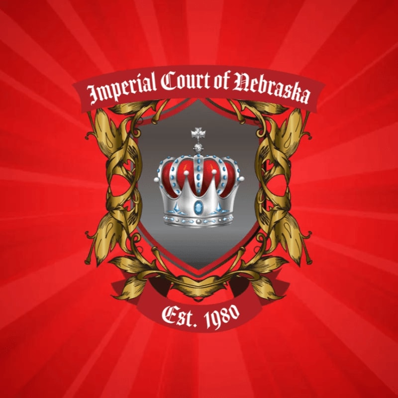 A silver crown with red and blue jewels sits within a shield adorned with golden leaves, all set against a vibrant red background with radiating lines.