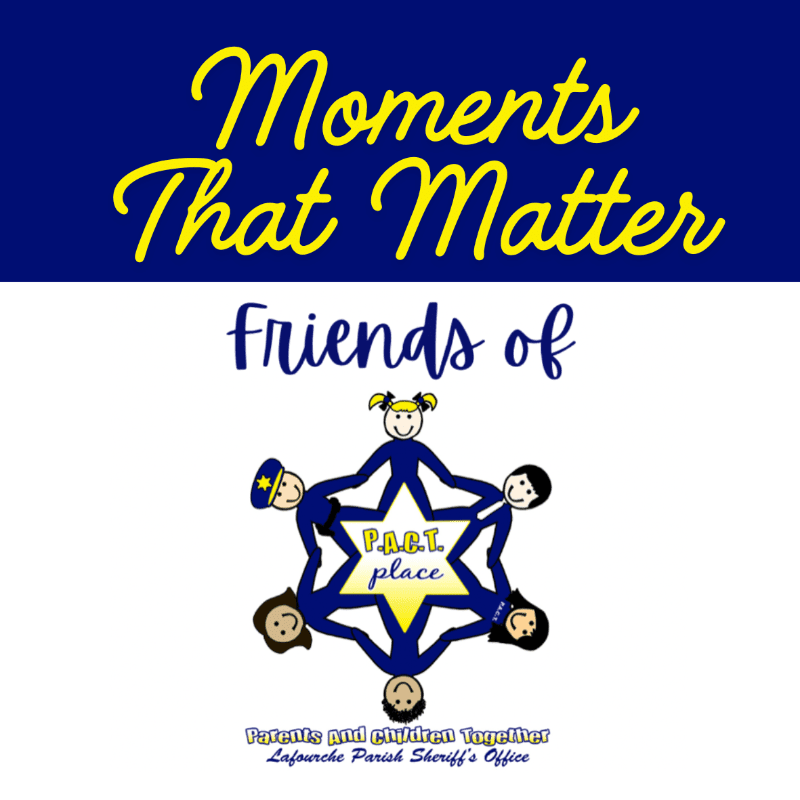 A cartoon illustration features five stick figures holding hands in a circle around a star with "P.A.C.T. place" in the center, set against a blue and white background with the text "Moments That Matter" and "Friends of" above, and "Parents and children Together Lafourche Parish Sheriff's Office" below.