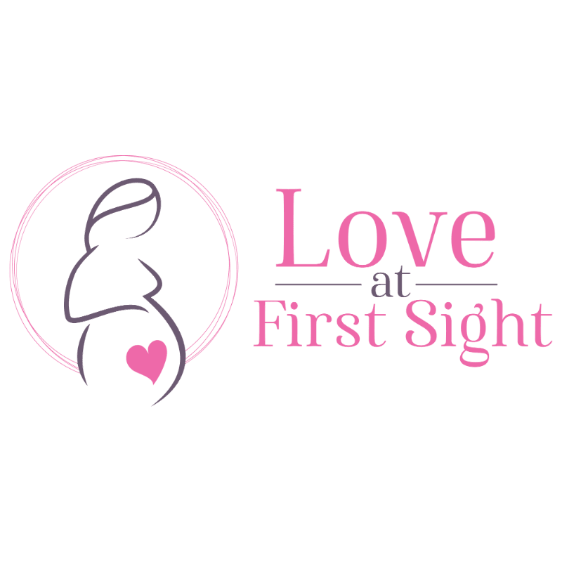 A stylized pregnant silhouette with a heart on its belly is to the left of the pink text "Love at First Sight" on a white background.