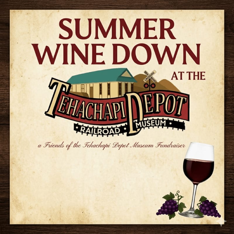A glass of red wine and grapes sit in the foreground of a poster advertising a "Summer Wine Down" at the Tehachapi Depot Museum, set against a rustic wooden background.