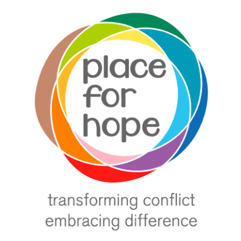 A colorful circular logo with the words "place for hope" in the center is set against a white background, with the tagline "transforming conflict embracing difference" below it.
