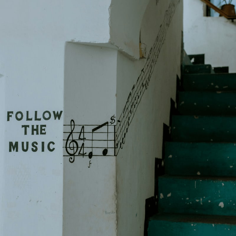 a set of stairs with a musical note painted on it