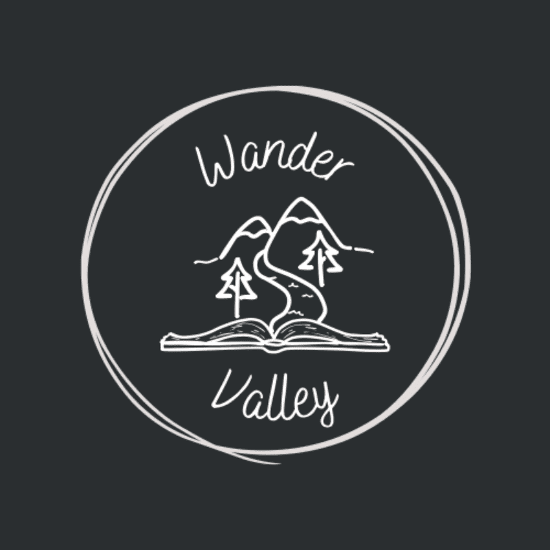 A hand-drawn logo features an open book in the foreground with a winding river, trees, and mountains in the background, all enclosed within a circular outline.