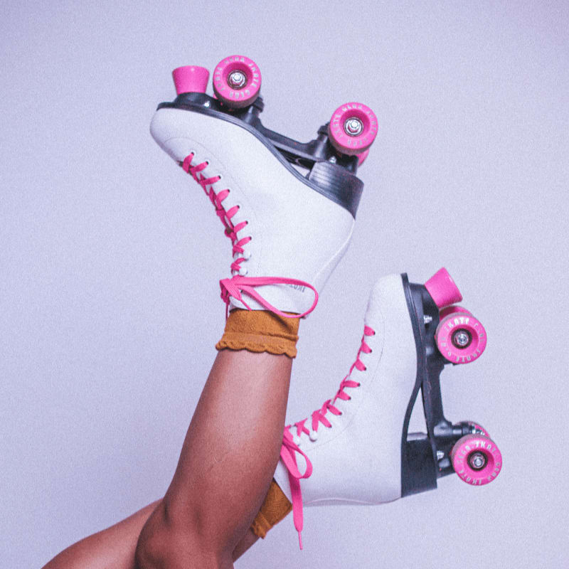 a person holding a skateboard