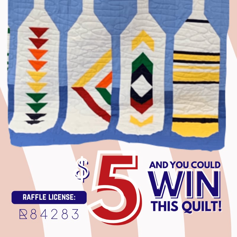 Four colorful, patterned paddles are displayed against a blue background, with a raffle advertisement for a $5 entry to win the quilt in the foreground.