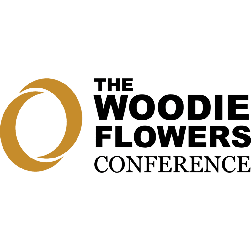 A gold, incomplete circle is to the left of bold black text that reads "THE WOODIE FLOWERS CONFERENCE" on a white background.