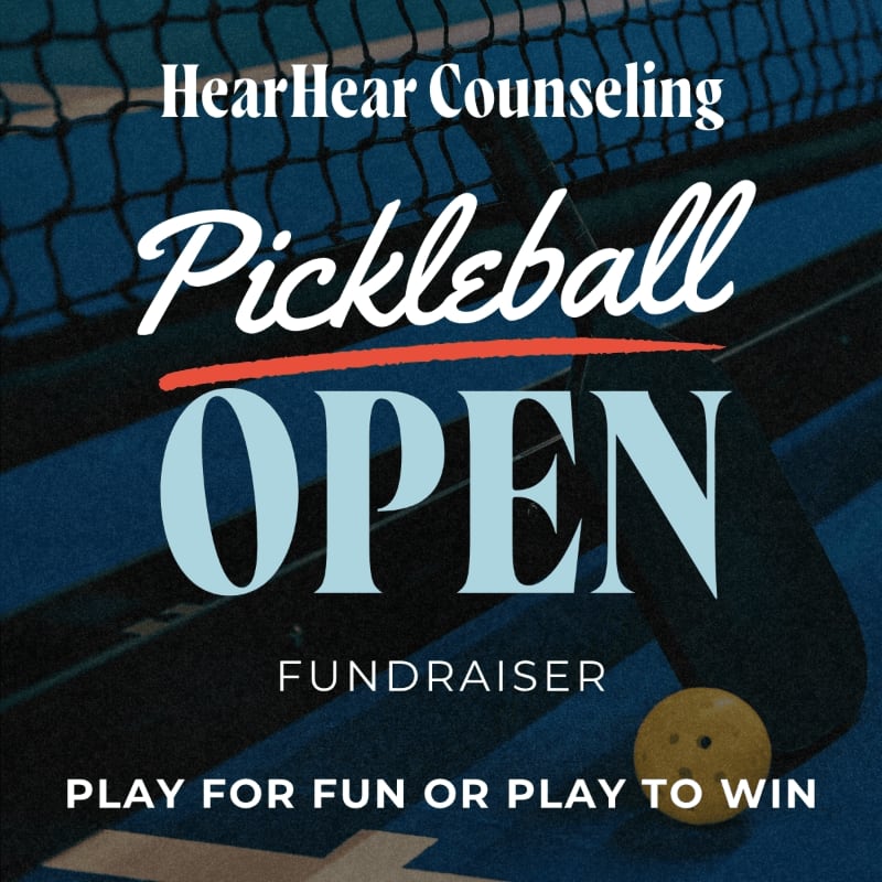 A pickleball paddle and ball rest on a blue court in the foreground, with a net and "HearHear Counseling Pickleball OPEN Fundraiser" text overlaying the background.