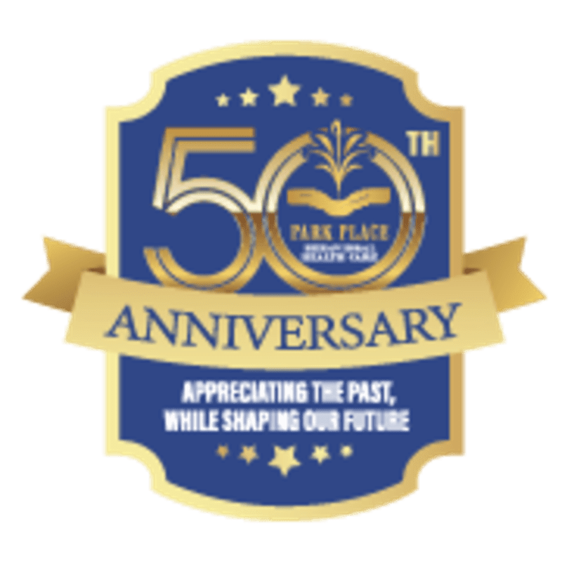 A golden ribbon with the word "ANNIVERSARY" in blue text is overlaid on a blue shield with a large "50" and stars, all against a white background.