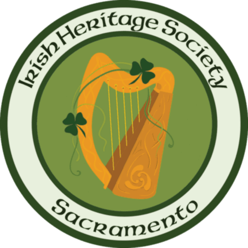 A golden harp adorned with shamrocks is centered within a green circular emblem that reads "Irish Heritage Society Sacramento."