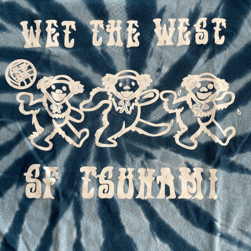White dancing bears and text are printed on a blue tie-dye background.
