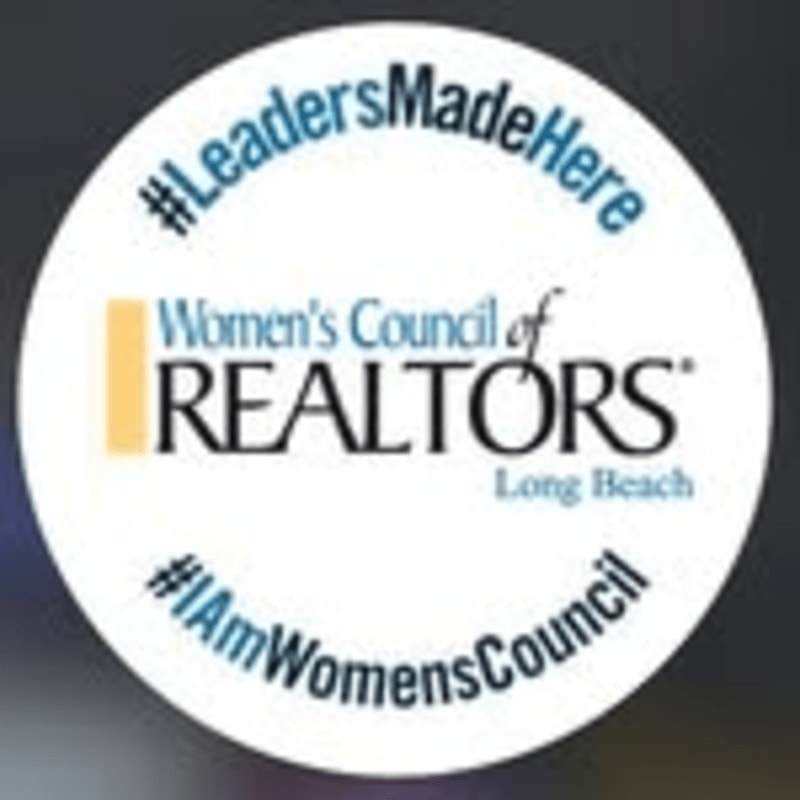 A circular logo with the text "#LeadersMadeHere" at the top, "Women's Council of REALTORS Long Beach" in the center, and "#IAmWomensCouncil" at the bottom, is set against a dark, blurred background.