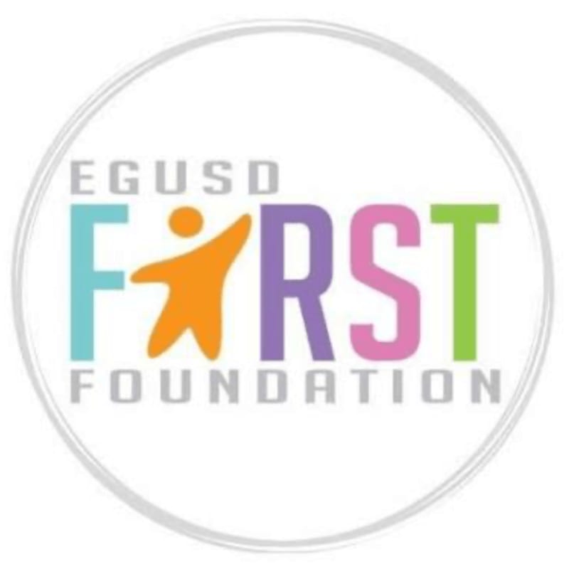 A circular logo with the words "EGUSD FIRST FOUNDATION" in colorful letters and a stylized orange figure in the foreground, set against a white background.