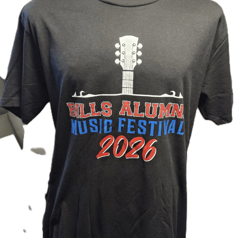 A black t-shirt with a graphic of a guitar headstock above "BILLS ALUMNI MUSIC FESTIVAL 2026" is displayed against a blurred white background.