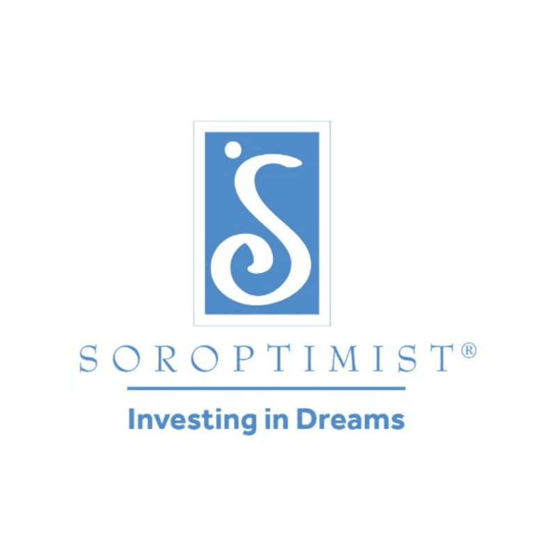 A blue and white Soroptimist logo with the tagline "Investing in Dreams" is centered on a plain white background.