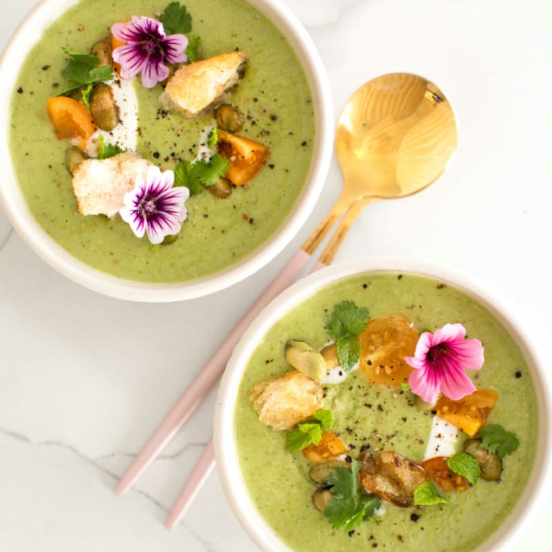 a bowl of soup with a spoon