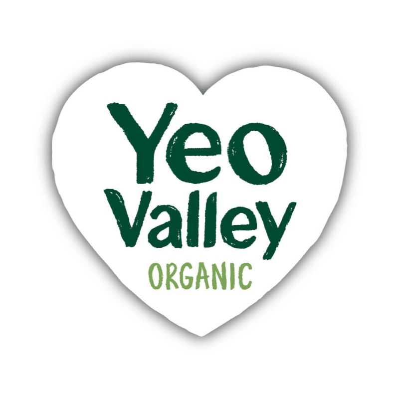 A white heart-shaped sticker with the green "Yeo Valley ORGANIC" logo is set against a plain white background.