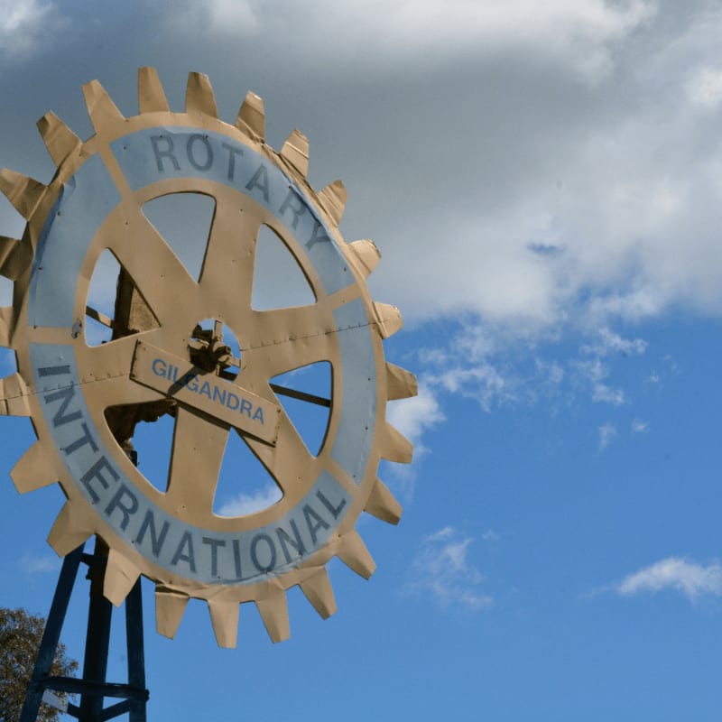 white and black round analog clock under blue sky during daytime