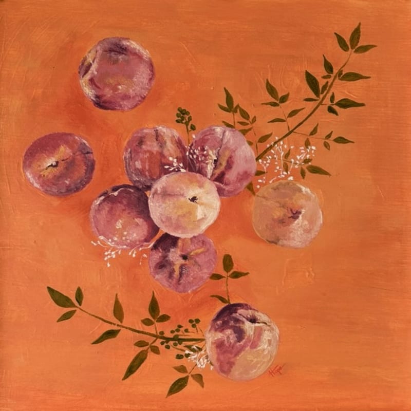 A cluster of ripe plums and delicate greenery are arranged on a vibrant orange background.