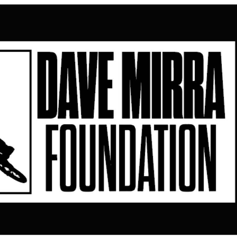 A black and white logo for the Dave Mirra Foundation features a silhouette of a BMX rider in the foreground against a background of bold, block lettering.