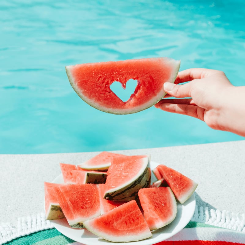 sliced watermelon on white paper