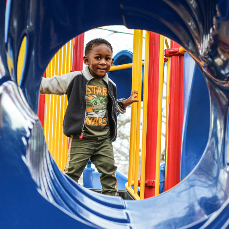 a boy on a slide