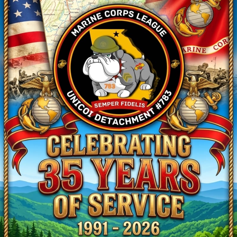 A Marine Corps League emblem featuring a bulldog is displayed prominently in the foreground, with a scenic mountain landscape and American flags in the background.