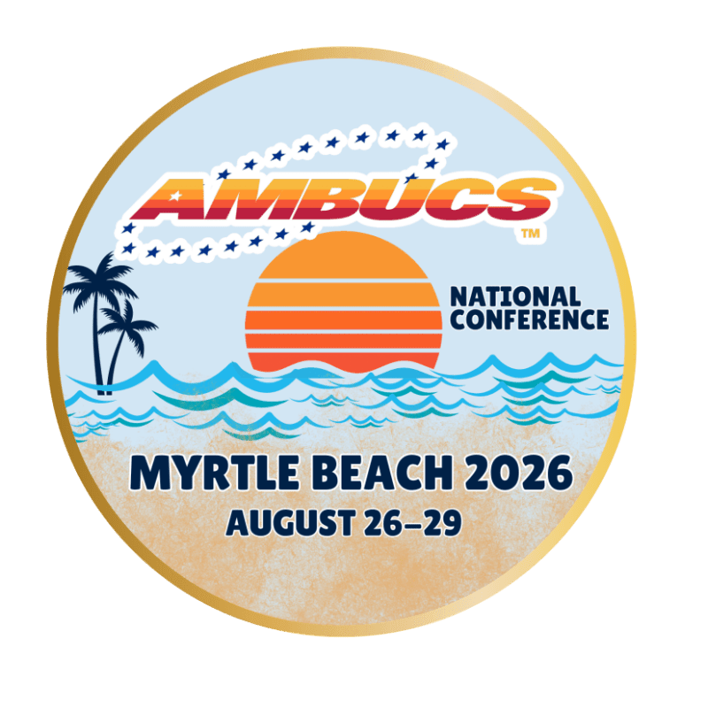 A circular logo features the word "AMBUCS" in bold, colorful letters above a sunset over wavy ocean waters, with palm trees on the left and text indicating "MYRTLE BEACH 2026 AUGUST 26-29" on a sandy beach in the foreground.