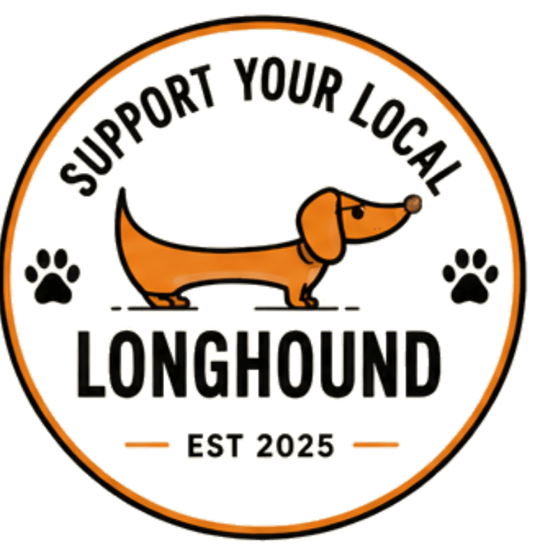 A cartoon dachshund with paw prints on either side is centered within a circular logo that reads "SUPPORT YOUR LOCAL LONGHOUND EST 2025" against a white background.