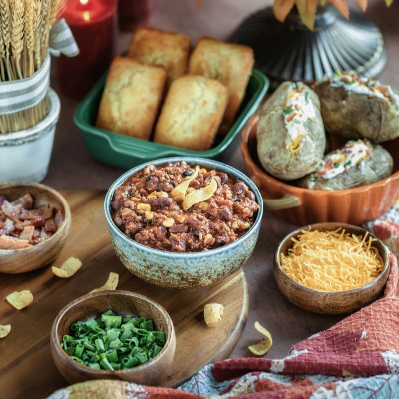 A table topped with bowls filled with food