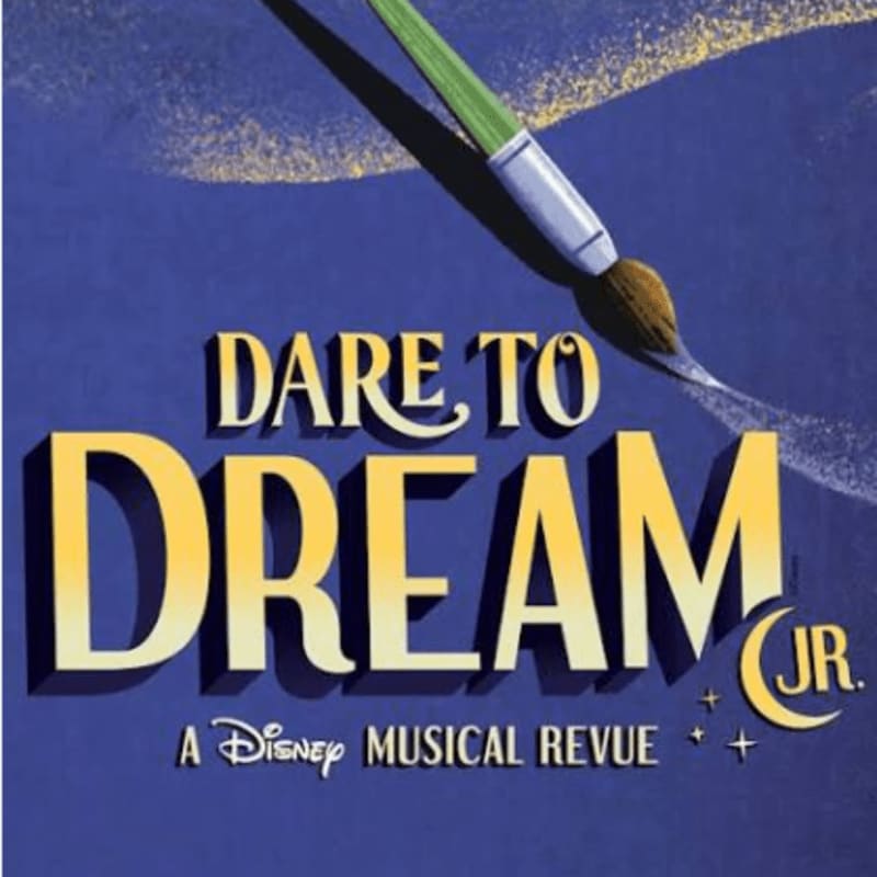 A paintbrush with a green handle and brown bristles paints golden stars and the words "DARE TO DREAM JR. A Disney Musical Revue" against a deep blue background.