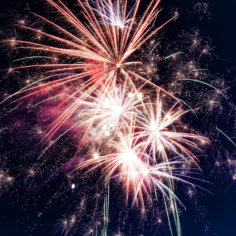 time lapse photography of fireworks at night