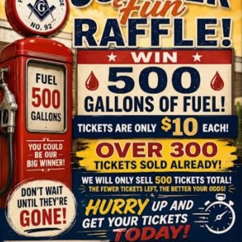 A vintage red gas pump with "FUEL 500 GALLONS" prominently displayed stands in the foreground against a background advertising a raffle for 500 gallons of fuel.