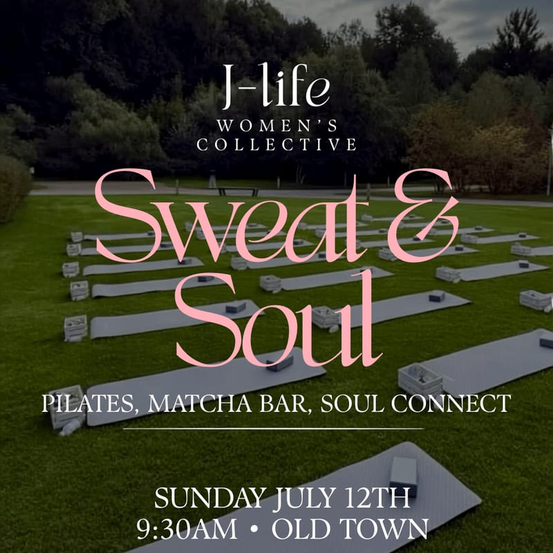 Yoga mats are neatly arranged on a grassy field in front of a wooded area, advertising a "Sweat & Soul" event by J-life Women's Collective.