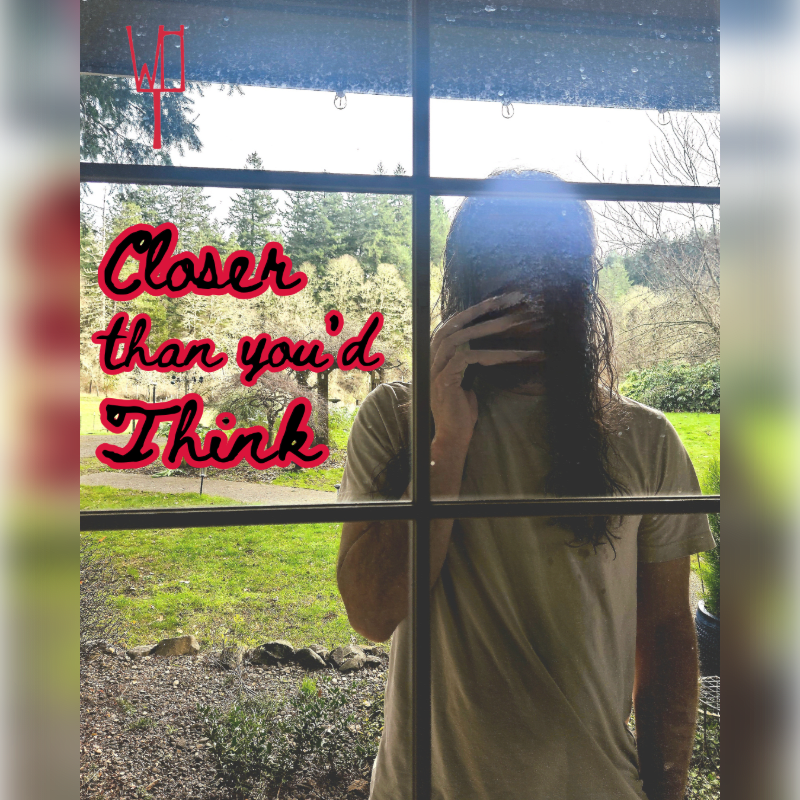 A person with long hair stands behind a window with text overlayed, obscuring their face, while a lush green landscape is visible in the background.