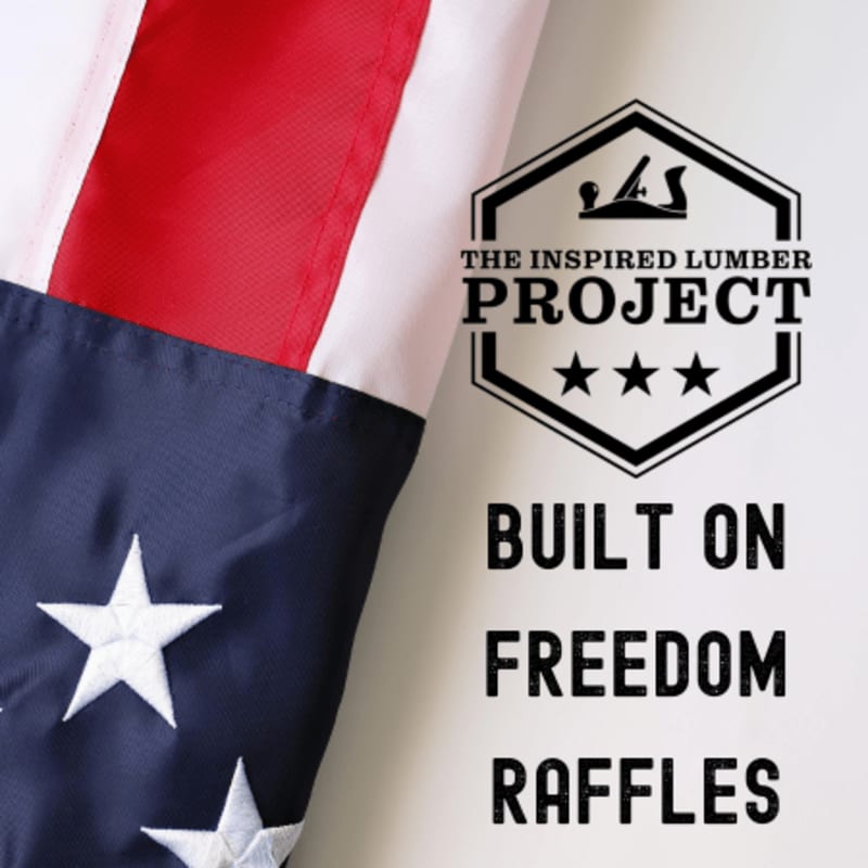 A close-up of the American flag's stars and stripes fills the left side of the frame, while the right side features a hexagonal logo for "The Inspired Lumber Project" above the text "BUILT ON FREEDOM RAFFLES."