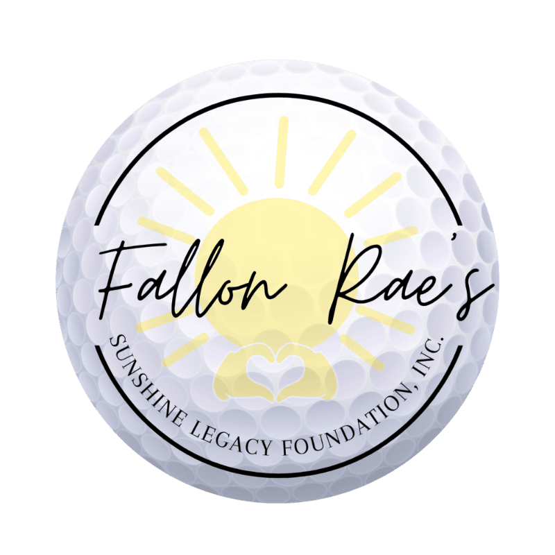 A textured golf ball with a logo featuring a yellow sun and the words "Fallon Rae's Sunshine Legacy Foundation, Inc." is centered against a plain white background.